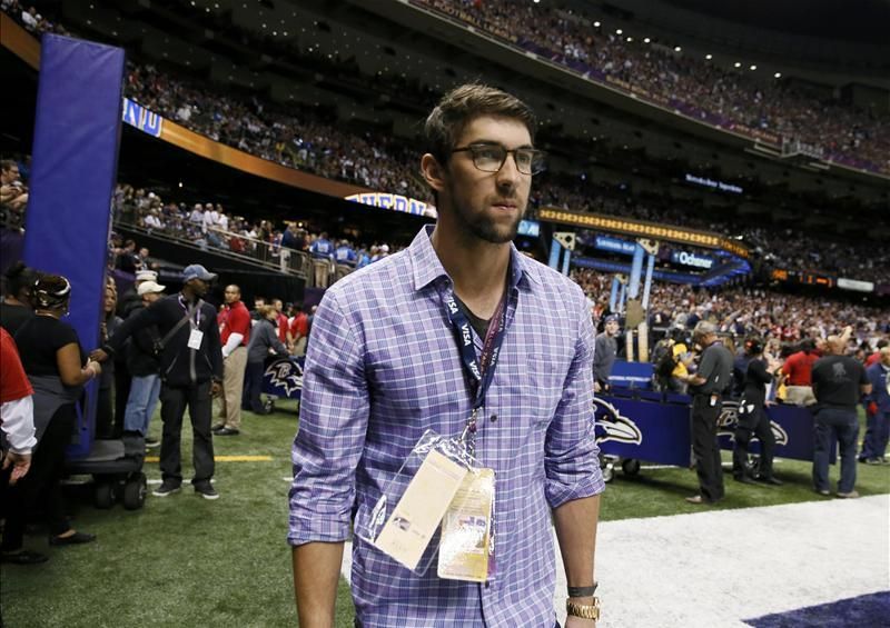Michael Phelps nem véletlenül viselt lila inget: a Baltimore Ravens-nek szurkolt