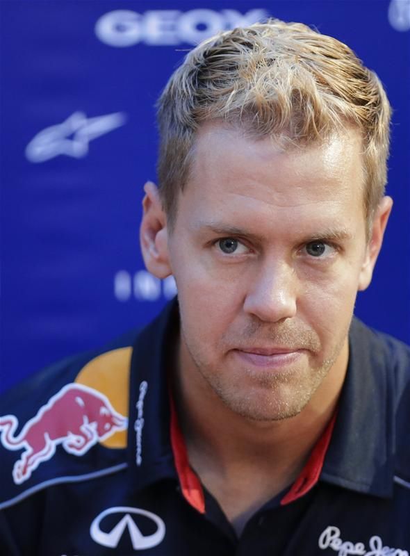 Vettel új frizurával érkezett Szingapúrba