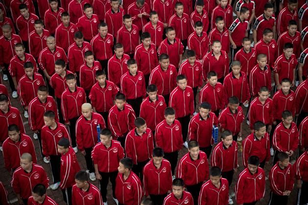 A kínai stratégiai terv szerint 2020-ig 50 millió fiatalnak kellene futballoznia az országban. 2050-re a cél a futballhatalmi státusz elérése (Fotó: AFP/Nicolas Asfouri)