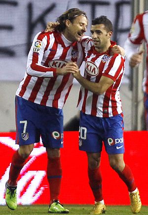 Forlán és Simao találatai okozták a Barca vesztét (Fotó: Reuters)