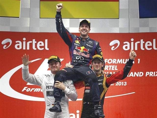 Indiában Nico Rosberg és Romain Grosjean emelhette a vállára Vettelt a dobogón
