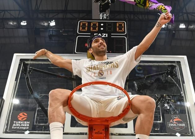 Real last won the EuroLeague in 2018, and Facundo Campazzo of Argentina was sitting on the rim celebrating… (Photo by AFP)
