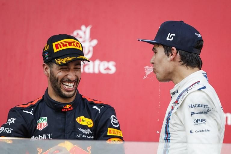 Daniel Ricciardo és Lance Stroll aligha hitte előzetesen, hogy a dobogóra állhat (Fotó: AFP)