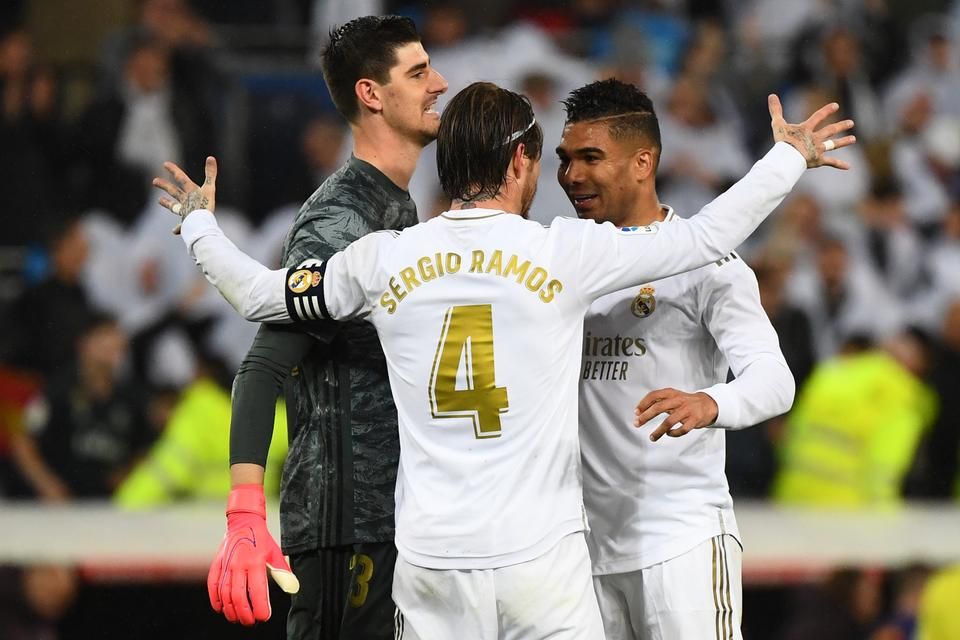 A siker zálogai: a kapus Courtois, a védelem és a csapat kapitánya, Ramos, valamint a középpálya szűrője, Casemiro 
(Fotó: AFP)