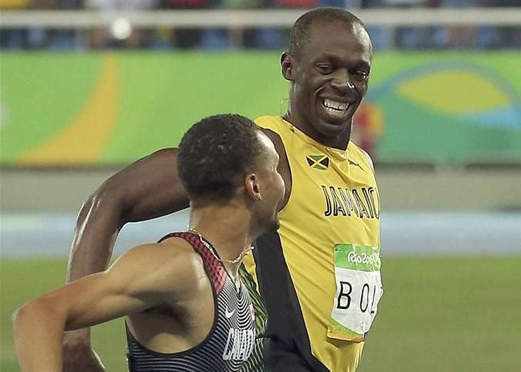 Usain Bolt és Andre De Grasse jól elszórakoztatták egymást a célvonal előtt (Fotó: Reuters)
