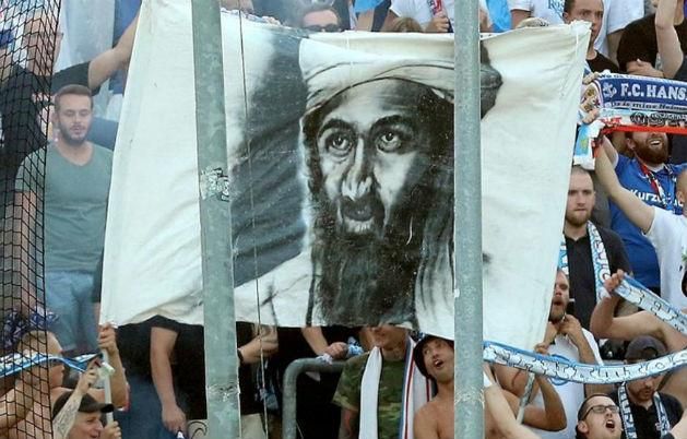 A rostocki szurkolók a terroristavezérről, Oszama bin Ladenről készítettek drapériát (Forrás: 101greatgoals.com)