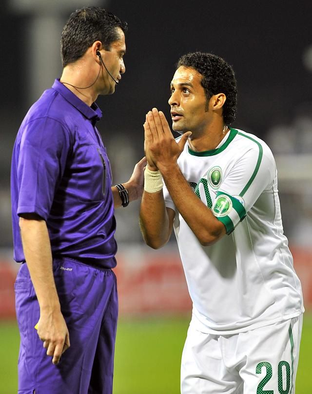 A szaúdi Jaszer al-Kahtani győzködi Kassai Viktort (Fotó: Reuters)
