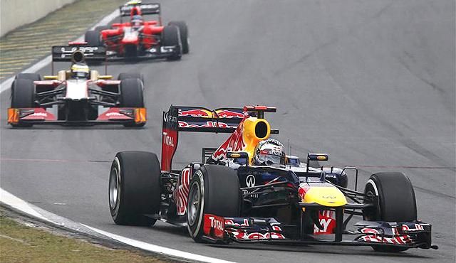 Sebastian Vettel sikeresen küzdött a riválisokkal, az elemekkel és az autójával: háromszoros világbajnok lett belőle (Fotó: Reuters)