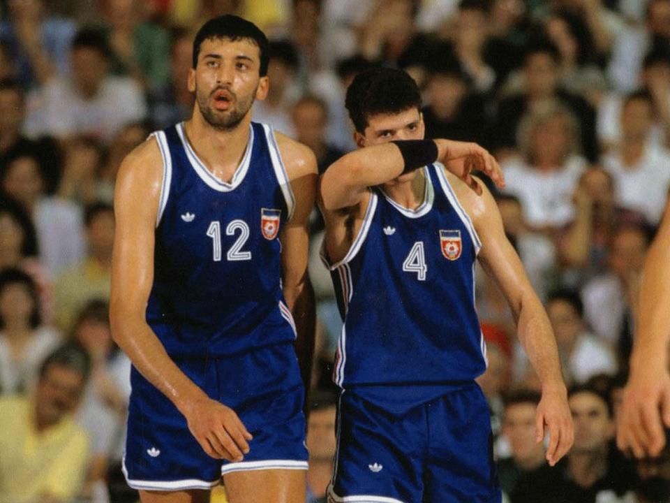 Vlade Divac and Dražen Petrović in blue, as friends