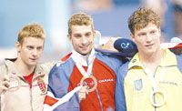 Az 50 méteres mellúszás legjobbjai: balra a büszke bronzos Flaskay, mellette a gyôztes brit Gibson és a második ukrán Liszogor (Fotó: Németh Ferenc)