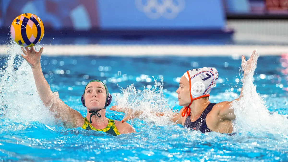 Women's water polo: The Dutch, who beat Hungary, lost to the Australians, and Canada beat China.