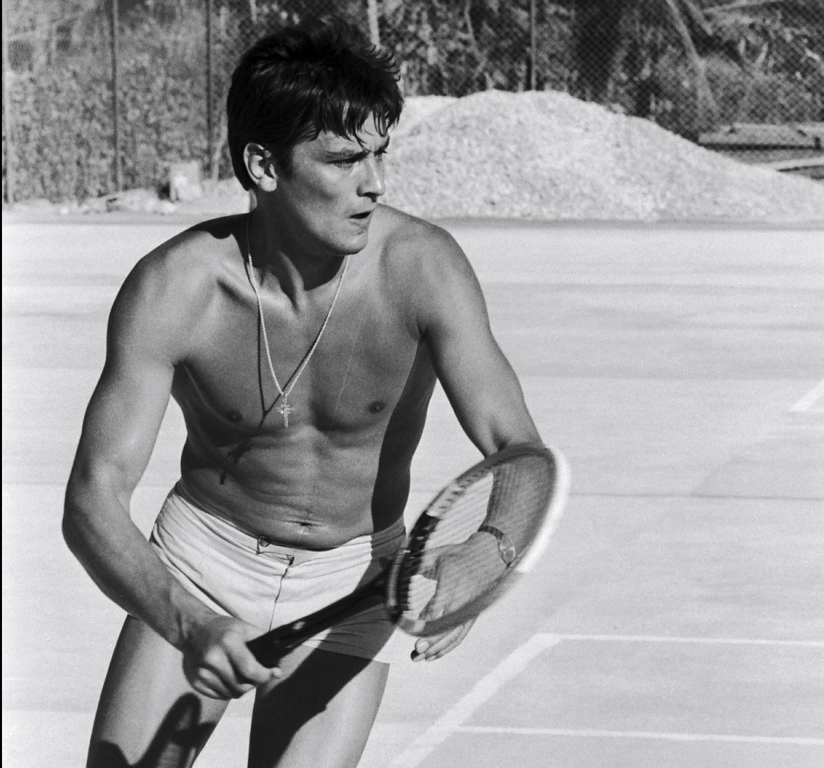 French Actor Alain Delon Playing Tennis In France On January 29, 1965