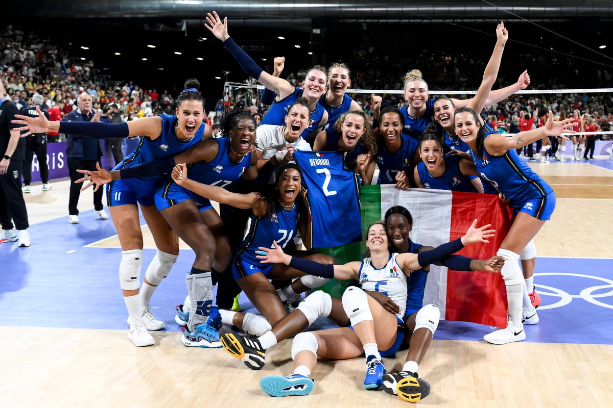 Italian players celebrate at the end of the Volleyball gold medal match between United States of America and Italy of th