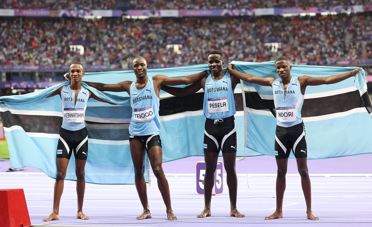 (240810) -- PARIS, Aug. 10, 2024 -- (L to R)Busang Collen Kebinatshipi, Letsile Tebogo, Anthony Pesela and Bayapo Ndori 