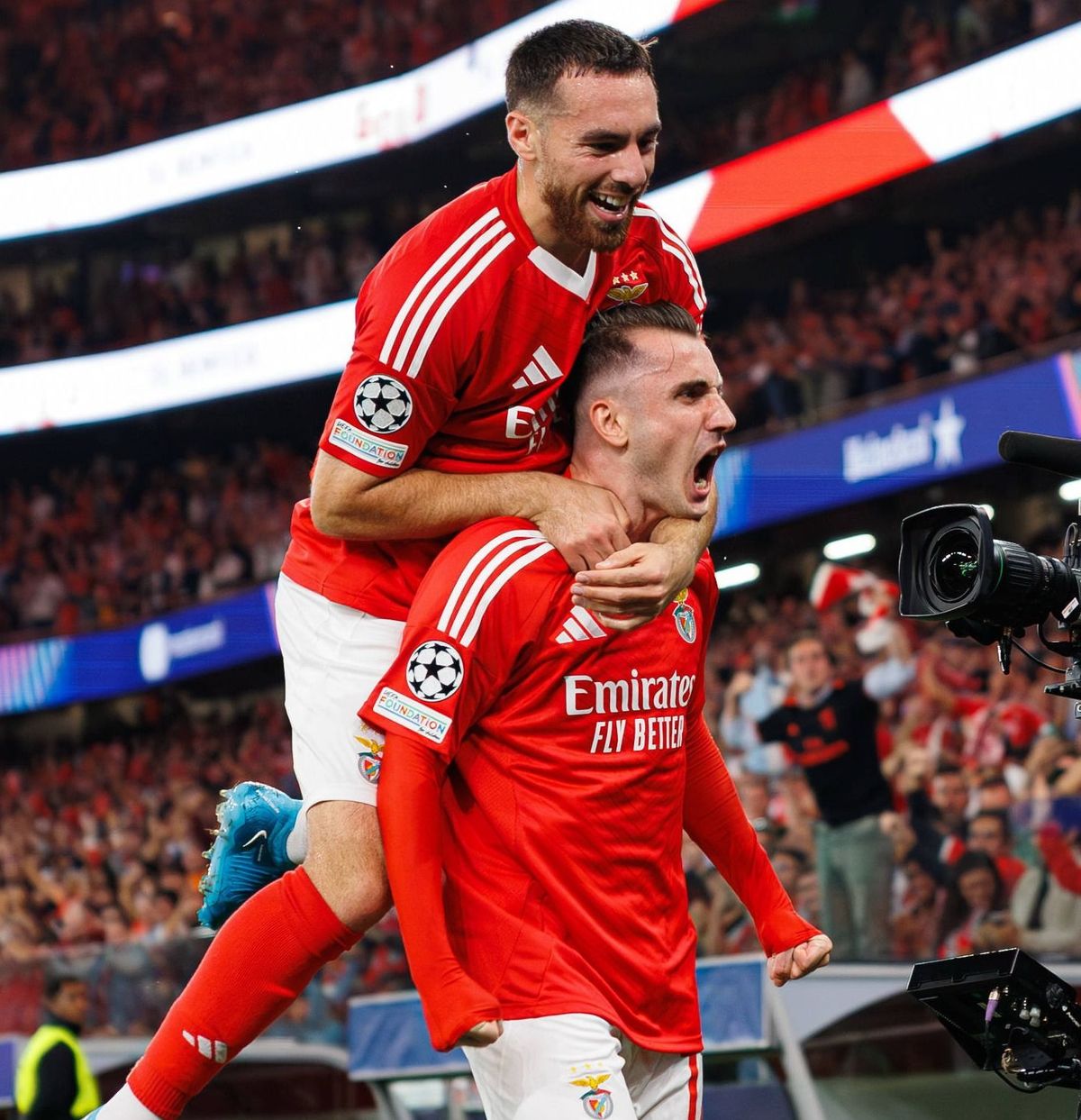 Kerem Akturkoglu seen celebrating after scoring goal with Orkun Kokcu during UEFA Champions League game between teams of