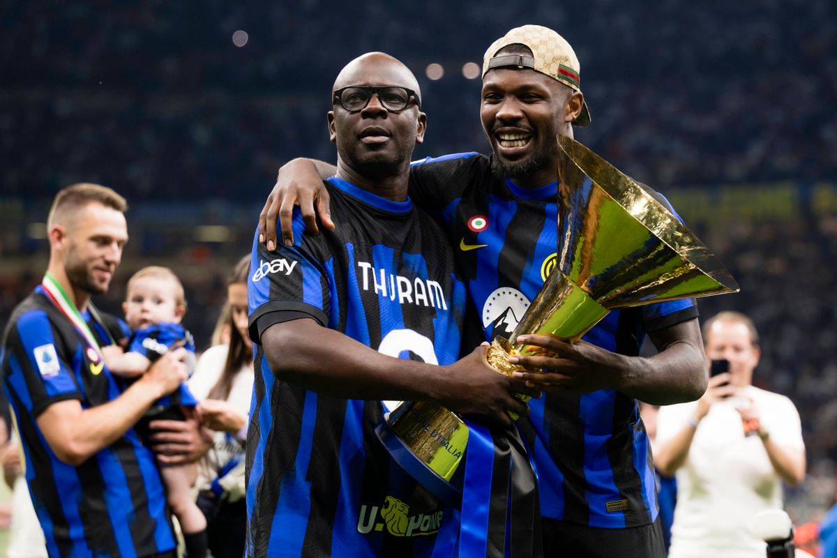 FC Internazionale v SS Lazio - Serie A Marcus Thuram of FC Internazionale and his father Lilian Thuram pose with the Scu