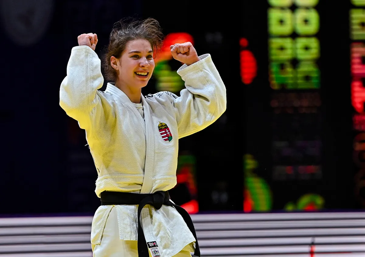 World Judo Championships Doha 2023 Lubjana Piovesana (blue) of Hungary reacts after winning against Szofi Ozbas (white)o