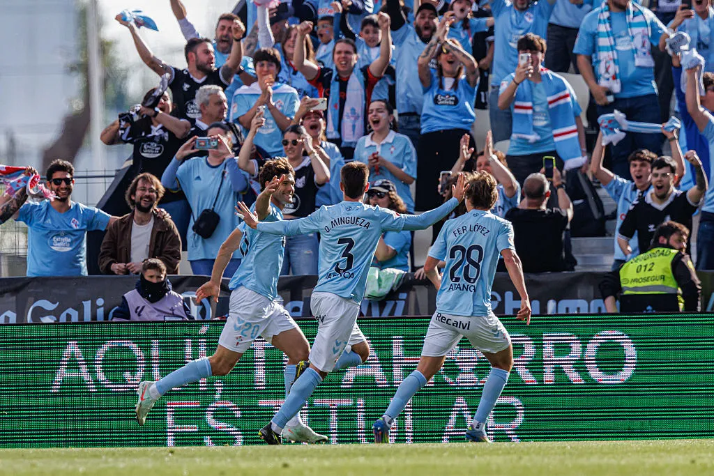 Players of Celta de Vigo seen celebrating after a goal from