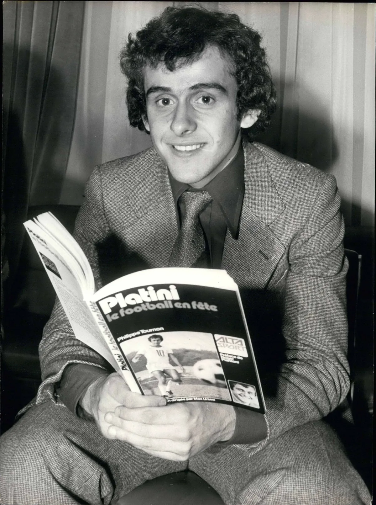 Feb. 01, 1977 - Michel Platini, on of the stars of France s soccer team, signed his book Celebrating Soccer, which was