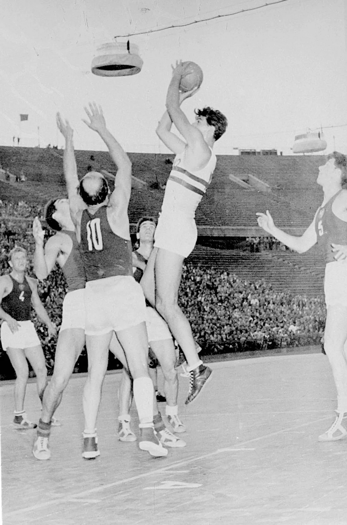 A general view of play in the match between Hungary and Russia in Budapest in which Bencze, the Hungarian No 12 is shown