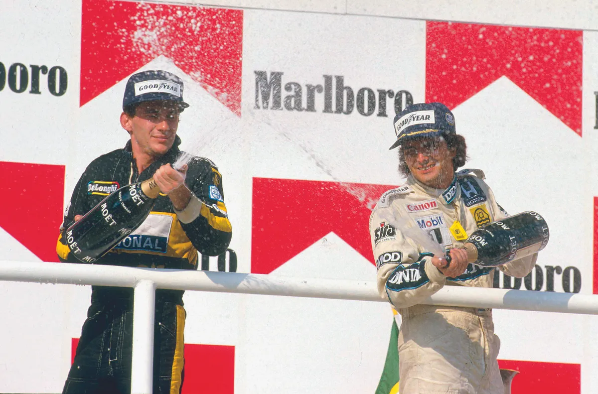 Hungaroring, Budapest, Hungary. 8-10 August 1986. Nelson Piquet (Williams Honda) 1st position with Ayrton Senna (Team L