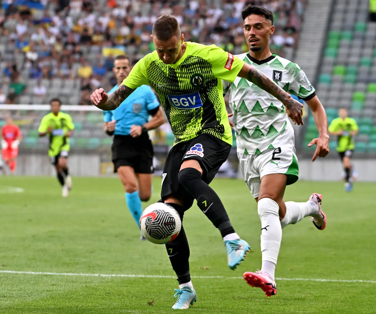 Ljubljana, Slovenia, 25th 2024: Oleksandr Nazarenko of Polissya Zhytomyr (L) in action against Jorge Silva of Olimpija L