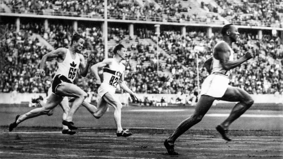 1936 - Berlin Olympics: Jesse Owens beating the 200 meter record in 20.7 seconds (time according to Associated Press Al